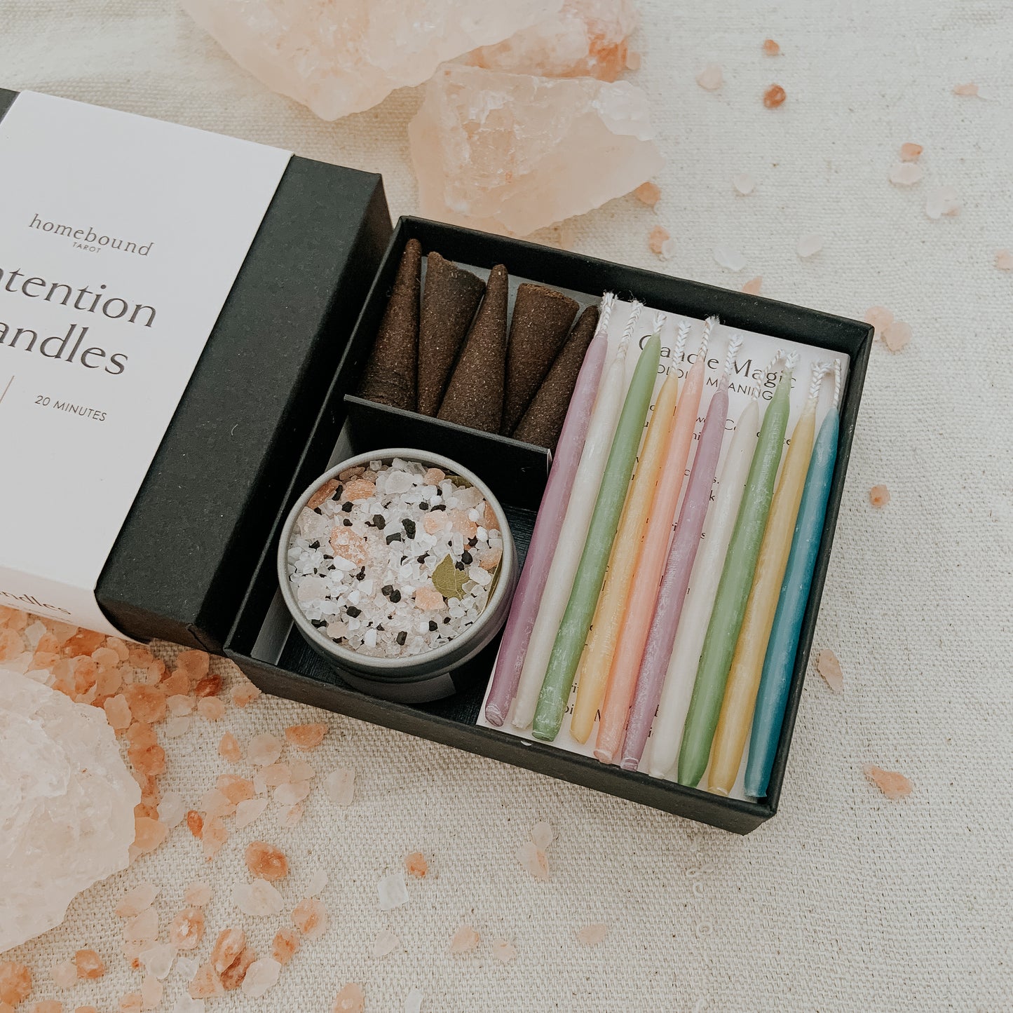 intention candle box open to show incense cones, 10 candles and the open salt tin